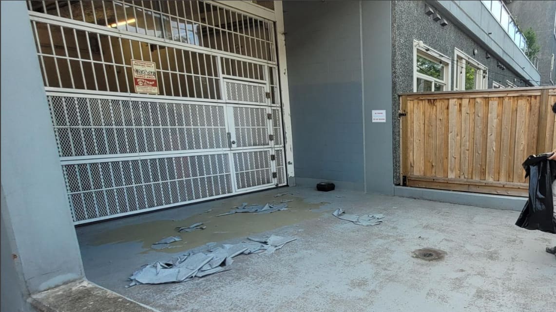 The old membrane stripped back at the parkade entrance, ready for the new system